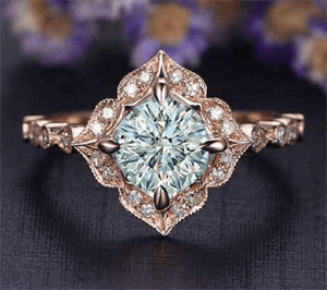 Squared vintage leaf motif Rigal halo engagement ring Squared vintage leaf motif Rigal halo engagement ring